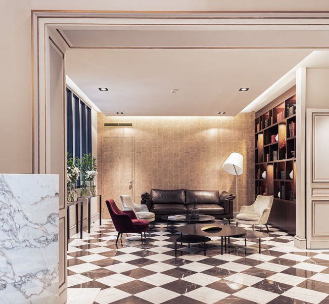 Le salon des Villas Foch à Bordeaux, sol en marbre damier et comptoir de marbre