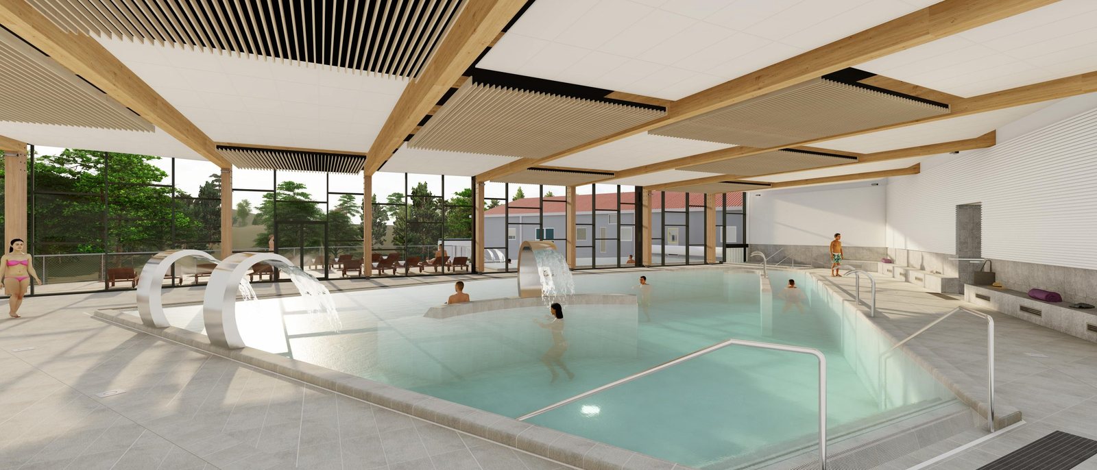 Le bassin intérieur d'eau thermale des Thermes des Fumades, ses banquettes à bulles et sa grande baie vitrée ouverte sur le jardin